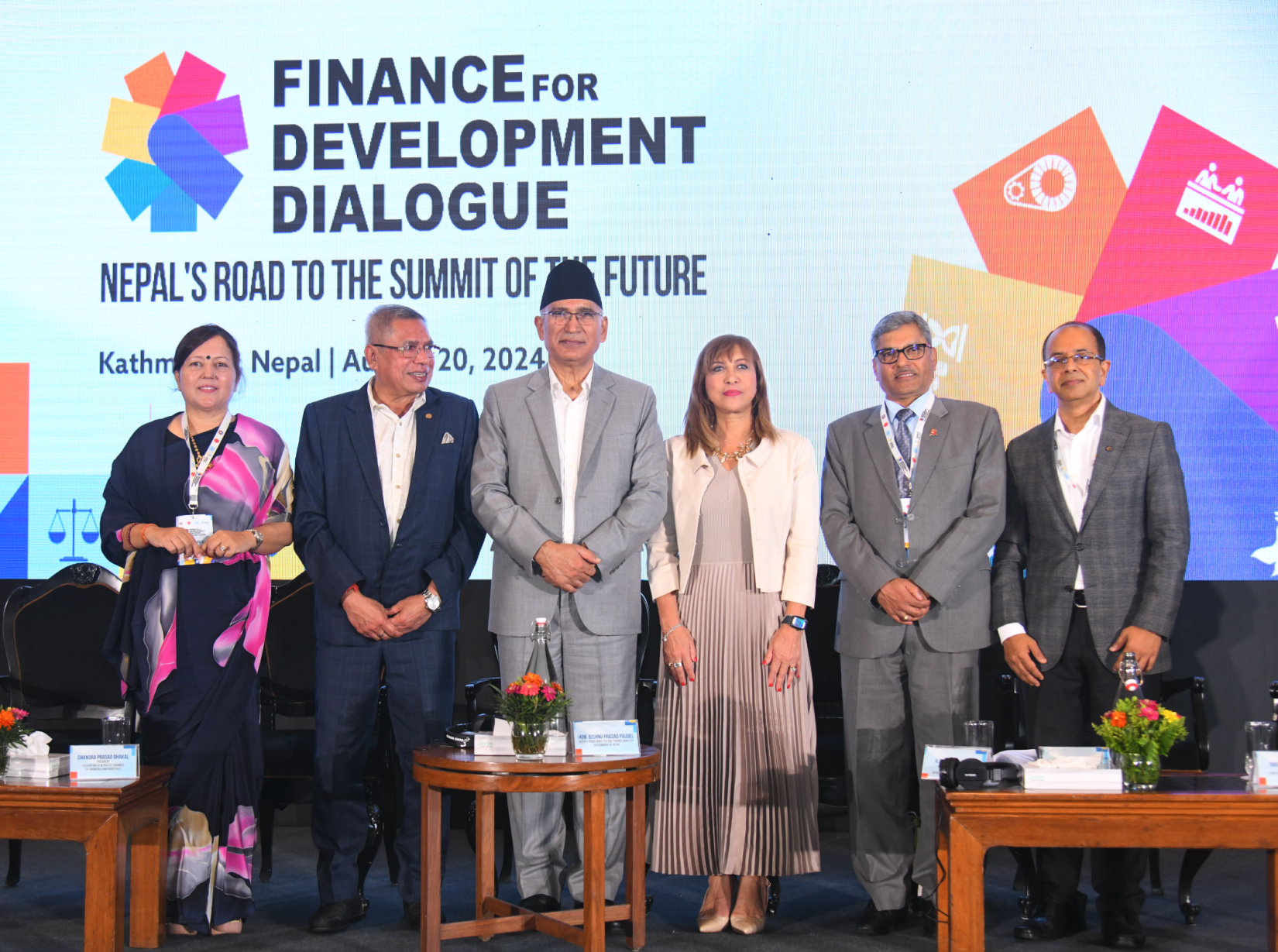 Members of the Opening Plenary of the Finance for Development Dialogue. From left: Ms. Shova Gyawali FWEAN President, Mr. Kamlesh Kumar Agrawal, President, NCC; Hon’ble Bishnu Prasad Paudel, Deputy Prime Minister and Finance Minister, Government of Nepal; Mr. Maha Prasad Adhikari, Governor, Nepal Rastra Bank, Nepal; Ms. Hanaa Singer-Hamdy, UN Resident Coordinator in Nepal; and Mr. Birendra Raj Pande, Vice President, CNI