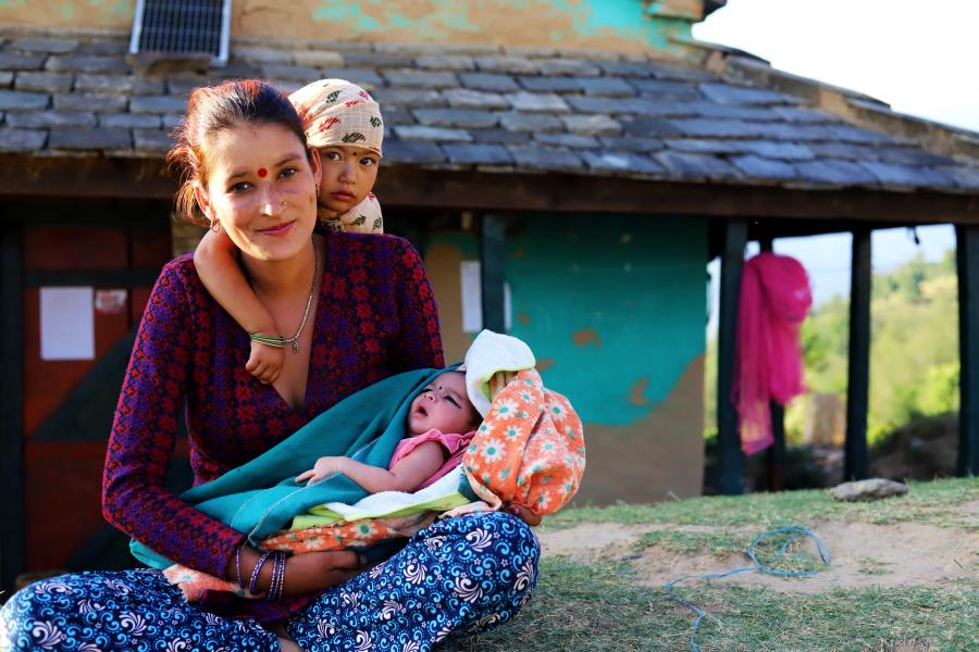 A 19-year-old girl from Dailekh district with her two children.