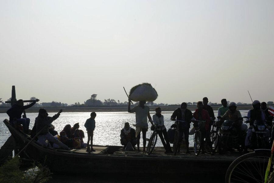 Locals travel by boat to a bordering Indian town to buy supplies at cheaper prices.