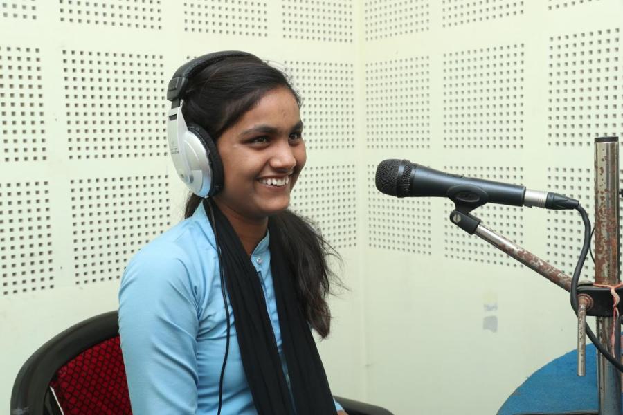 Sakila Khatun at the Rupantaran radio studio, in the process of recording a song she has written on the dowry system, inspired by an episode of the show.