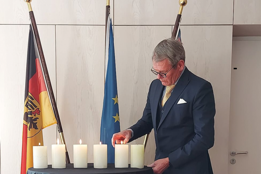 His Excellency Dr Tomas Prinz, German Ambassador to Nepal lighting six candles in the memory of six million jews perished in Holocaust