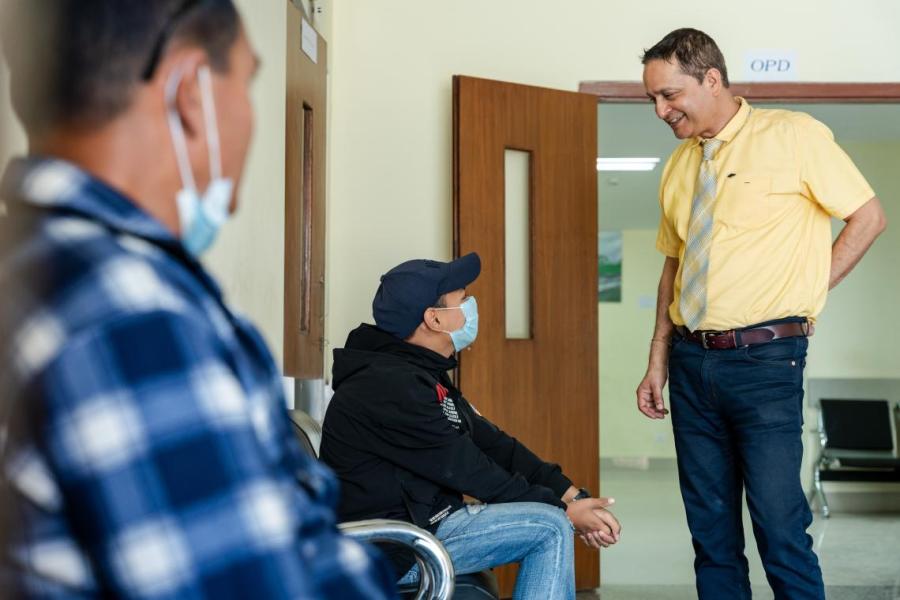 Dr Arun Raj Kunwar (right) talks to a visitor at the Kanti Children’s Hospital in Kathmandu, Nepal.