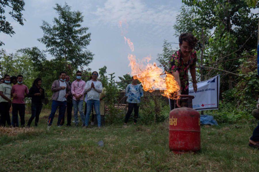 A participant takes part in the Dhangadhi-Sub Metropolitan City organized training on firefighting.