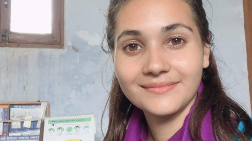 A headshot of the service provider with brown hair and brown eyes looking in front of the camera and smiling.